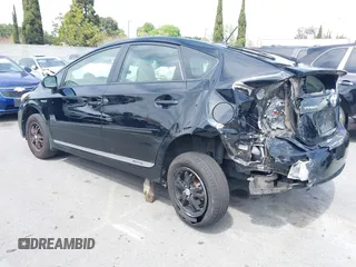 2012 Toyota Prius One z VIN JTDKN3DU2C5495575, wystawiony jako IAAI lot #41905961 z przebiegiem 97 186 mil mil oraz . Historia ofert i sprzedaży dostępna na DreamBid. Obrazek 3.