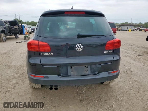 2012 Volkswagen Tiguan SE z VIN WVGAV7AX2CW575871, wystawiony jako Copart lot #58050865 z przebiegiem 96 569 mil mil oraz Szkody całkowita. Historia ofert i sprzedaży dostępna na DreamBid. Obrazek 6.