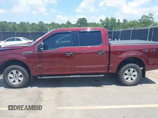 2015 Ford F-150 XLT with VIN 1FTEW1EG4FFC63243, listed as a IAAI auction lot 42566883 with 101,547 mi miles and . Bid and sale history available at DreamBid. Image 14.