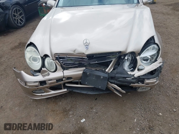 2005 Mercedes-Benz E-Class 3.2L with VIN WDBUF65J25A614469, listed as a IAAI auction lot 41521864 with 90,403 mi miles. Bid and sale history available at carsss.com. Image 6.