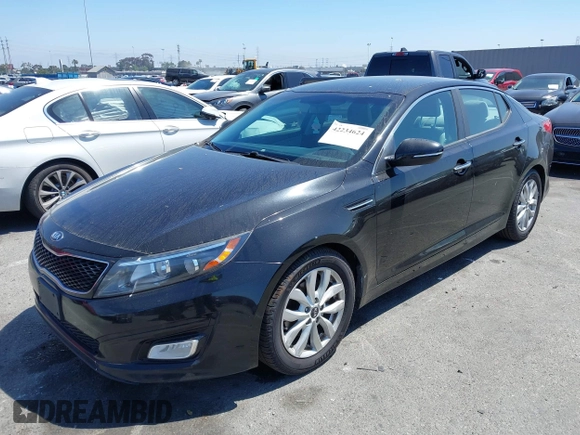 2015 Kia Optima LX with VIN KNAGM4A7XF5615069, listed as a IAAI auction lot 42234624 with 174,078 mi miles and . Bid and sale history available at DreamBid. Image 6.