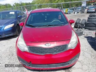 2015 Kia Rio LX with VIN KNADM4A33F6427021, listed as a IAAI auction lot 42011458 with 184,738 mi miles. Bid and sale history available at carsss.com. Image 6.
