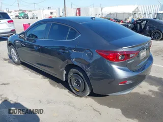 2016 Mazda Mazda3 i Grand Touring with VIN JM1BM1X79G1278079, listed as a IAAI auction lot 42010729 with 104,797 mi miles. Bid and sale history available at carsss.com. Image 3.