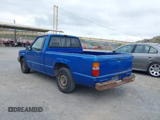 1990 Mitsubishi Mighty Max with VIN JA7FL24W8LP030657, listed as a IAAI auction lot 42014231 with 376,787 mi miles and . Bid and sale history available at DreamBid. Image 3.