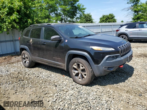 2015 Jeep Cherokee Trailhawk with VIN 1C4PJMBS6FW785891, listed as a Copart auction lot 61040565 with 156,421 mi miles and Clean title. Bid and sale history available at DreamBid. Image 4.