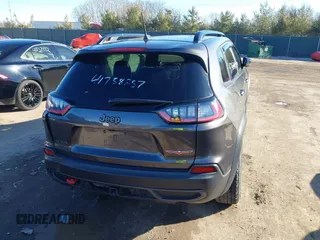 2022 Jeep Cherokee Trailhawk with VIN 1C4PJMBX9ND522235, listed as a IAAI auction lot 41738257 with 24,911 mi miles and . Bid and sale history available at DreamBid. Image 4.