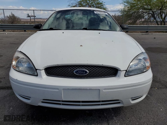 2006 Ford Taurus SE с VIN 1FAFP53U96A187491, выставлен на аукционе Copart как лот 55109005 с пробегом 121 856 миль миль и Списание • Salvage title. История ставок и продаж доступна на DreamBid. Изображение 5.