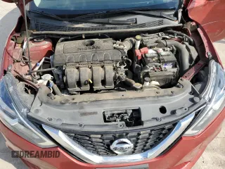 2017 Nissan Sentra SV z VIN 3N1AB7AP3HY263719, wystawiony jako Copart lot #55816355 z przebiegiem 124 585 mil mil oraz Szkoda całkowita • Salvage title. Historia ofert i sprzedaży dostępna na DreamBid. Obrazek 11.