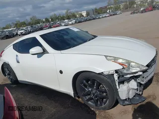 2016 Nissan 370Z Sport z VIN JN1AZ4EH9GM931683, wystawiony jako IAAI lot #42000779 z przebiegiem 113 919 mil mil oraz . Historia ofert i sprzedaży dostępna na DreamBid. Obrazek 13.