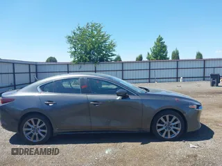 2019 Mazda 3 Select with VIN JM1BPBAM3K1140283, listed as a IAAI auction lot 42666287 with 76,106 mi miles and . Bid and sale history available at DreamBid. Image 12.