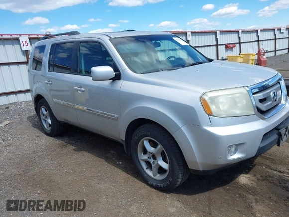 2009 Honda Pilot Touring with VIN 5FNYF48969B018075, listed as a IAAI auction lot 42052333 with 206,700 mi miles and . Bid and sale history available at carsss.com. Image 1.