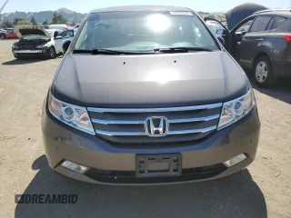 2012 Honda Odyssey Touring с VIN 5FNRL5H9XCB116455, выставлен на аукционе Copart как лот 60880835 с пробегом 96 672 миль миль и Списание • Salvage title. История ставок и продаж доступна на DreamBid. Изображение 5.