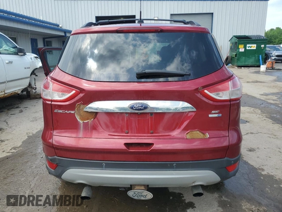 2014 Ford Escape SE с VIN 1FMCU9G9XEUC48634, выставлен на аукционе Copart как лот 59497745 с пробегом 166 553 миль миль и Списание • Salvage title. История ставок и продаж доступна на DreamBid. Изображение 6.