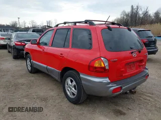 2004 Hyundai Santa Fe GLS with VIN KM8SC13D24U724643, listed as a IAAI auction lot 41908475 with 82,656 mi miles. Bid and sale history available at carsss.com. Image 3.