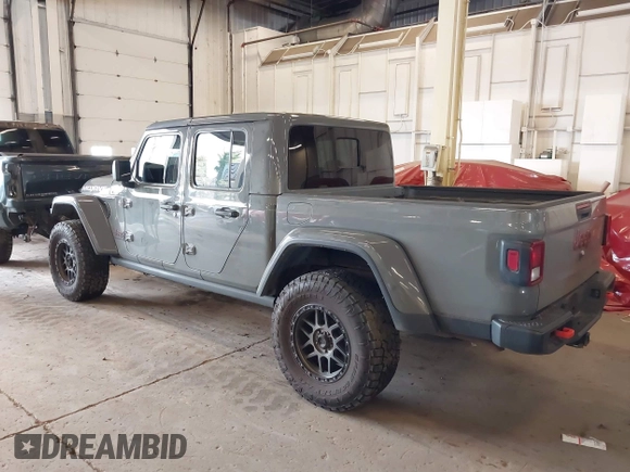 2021 Jeep Gladiator Mojave with VIN 1C6JJTEG1ML596109, listed as a IAAI auction lot 41783913 with 71,112 mi miles and . Bid and sale history available at DreamBid. Image 3.