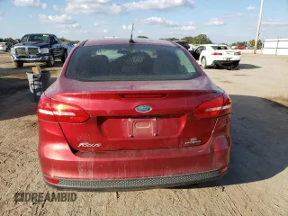 2015 Ford Focus SE с VIN 1FADP3F21FL273646, выставлен на аукционе Copart как лот 77027184 с пробегом 140 098 миль миль и Списание • Salvage title. История ставок и продаж доступна на DreamBid. Изображение 6.