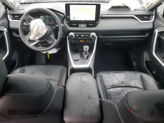 2024 Toyota RAV4 Hybrid XLE Premium with VIN 2T3B6RFV6RW066043, listed as a Copart auction lot 43470115 with 9,454 mi miles and Salvage Title. Bid and sale history available at DreamBid. Image 8.