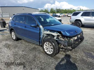 2018 Volkswagen Tiguan S with VIN 3VV0B7AX2JM019924, listed as a Copart auction lot 56138375 with 76,798 mi miles and Salvage title. Bid and sale history available at DreamBid. Image 4.