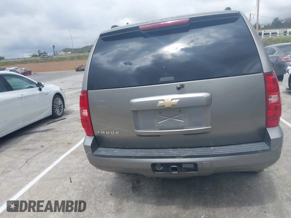 2007 Chevrolet Tahoe LT z VIN 1GNFC13J07J122414, wystawiony jako IAAI lot #39134539 z przebiegiem Nie podano mil oraz . Historia ofert i sprzedaży dostępna na DreamBid. Obrazek 15.