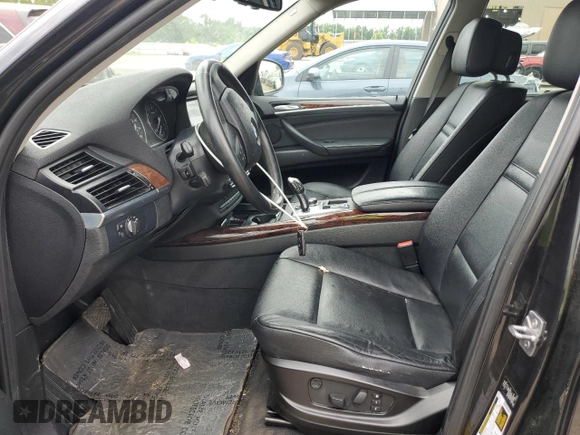 2012 BMW X5 35i with VIN 5UXZV4C50CL989832, listed as a Copart auction lot 62606485 with 157,025 mi miles and Clean title. Bid and sale history available at DreamBid. Image 7.