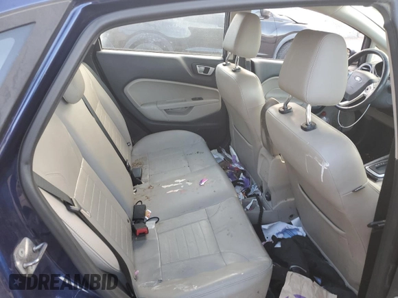 2016 Ford Fiesta Titanium z VIN 3FADP4CJ5GM175110, wystawiony jako Copart lot #89137195 z przebiegiem 129 193 mil mil oraz Szkoda całkowita • Salvage title. Historia ofert i sprzedaży dostępna na DreamBid. Obrazek 11.