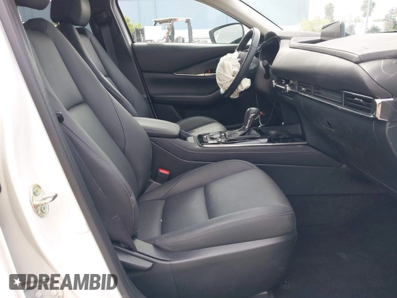 2023 Mazda CX-30 S Carbon Edition with VIN 3MVDMBCM0PM569100, listed as a IAAI auction lot 41978191 with 20,470 mi miles and . Bid and sale history available at DreamBid. Image 5.