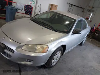 2002 Dodge Stratus SE with VIN 1B3EL36R72N191069, listed as a IAAI auction lot 40253788 with 112,489 mi miles. Bid and sale history available at carsss.com. Image 2.