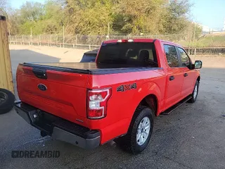 2020 Ford F-150 XL with VIN 1FTEW1E41LKE81388, listed as a IAAI auction lot 42015490 with 113,099 mi miles. Bid and sale history available at carsss.com. Image 1.