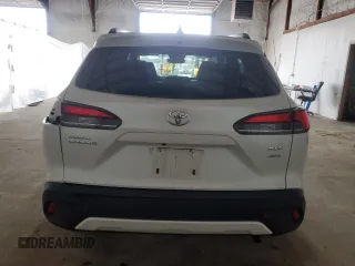 2023 Toyota Corolla Cross XLE with VIN 7MUDAABG7PV068968, listed as a Copart auction lot 51922695 with 43,911 mi miles and Salvage title. Bid and sale history available at DreamBid. Image 6.