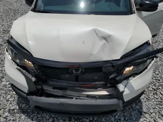 2019 Honda Passport Sport with VIN 5FNYF7H29KB004245, listed as a Copart auction lot 58518575 with 89,806 mi miles and Salvage title. Bid and sale history available at DreamBid. Image 12.