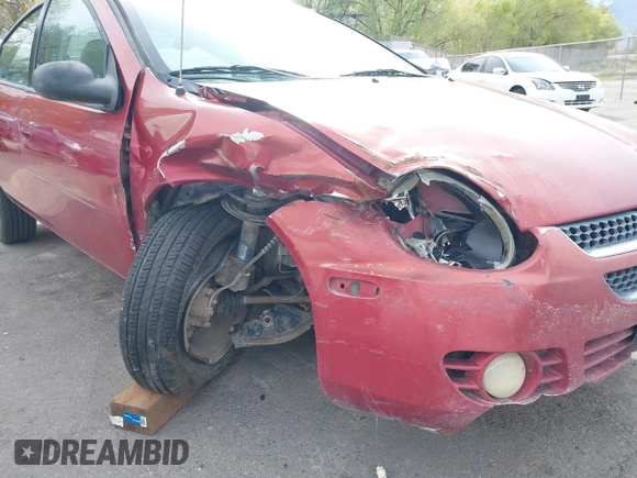 2004 Dodge Neon SXT with VIN 1B3ES56C04D504384, listed as a IAAI auction lot 41988581 with 166,602 mi miles. Bid and sale history available at carsss.com. Image 6.