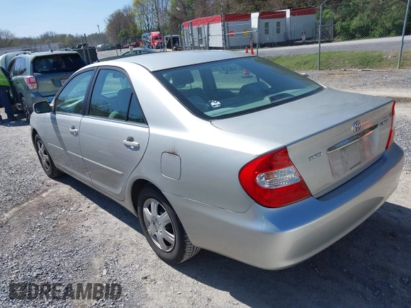 2004 Toyota Camry LE with VIN 4T1BE30K14U290983, listed as a IAAI auction lot 41983078 with 174,852 mi miles and . Bid and sale history available at carsss.com. Image 3.