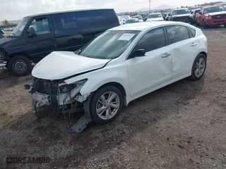2013 Nissan Altima 2.5 SL with VIN 1N4AL3AP7DN474731, listed as a IAAI auction lot 41439282 with 180,718 mi miles. Bid and sale history available at carsss.com. Image 2.