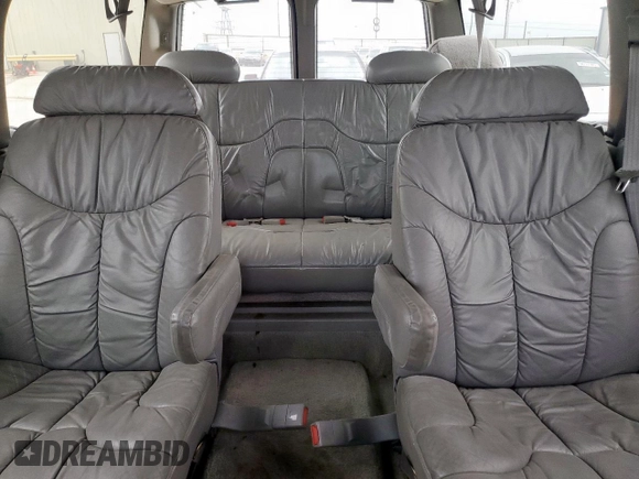 1999 Chevrolet Suburban with VIN 1GBEC16R0XJ434453, listed as a Copart auction lot 54711725 with 179,597 mi miles and Clean title. Bid and sale history available at DreamBid. Image 10.