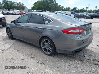 2013 Ford Fusion Titanium with VIN 3FA6P0K96DR131317, listed as a IAAI auction lot 42552736 with 154,762 mi miles and . Bid and sale history available at DreamBid. Image 3.