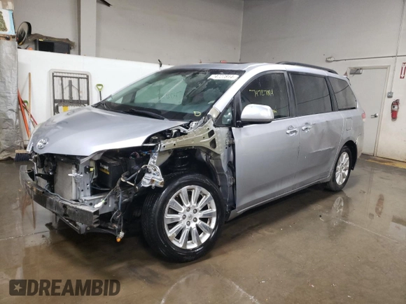 2012 Toyota Sienna XLE z VIN 5TDDK3DC5CS033868, wystawiony jako Copart lot #74727814 z przebiegiem 98 798 mil mil oraz Szkoda całkowita • Salvage title. Historia ofert i sprzedaży dostępna na DreamBid. Obrazek 1.