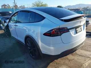 2022 Tesla Model X with VIN 7SAXCBE59NF364984, listed as a IAAI auction lot 41809256 with Not Provided miles and . Bid and sale history available at DreamBid. Image 3.