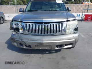 2003 Cadillac Escalade z VIN 1GYEK63N03R155894, wystawiony jako IAAI lot #42336523 z przebiegiem 188 332 mil mil oraz . Historia ofert i sprzedaży dostępna na DreamBid. Obrazek 6.