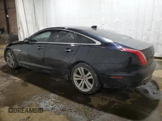 2016 Jaguar XJ with VIN SAJXJ1GD2G8V98776, listed as a Copart auction lot 41959995 with 77,391 mi miles and Salvage title. Bid and sale history available at DreamBid. Image 2.
