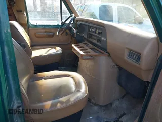 1990 Ford Econoline Cargo with VIN 1FTES14YXLHA99552, listed as a IAAI auction lot 41820558 with 178,000 mi miles and . Bid and sale history available at DreamBid. Image 5.