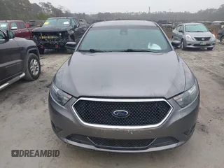 2014 Ford Taurus SHO with VIN 1FAHP2KT0EG171336, listed as a IAAI auction lot 41566688 with 154,328 mi miles. Bid and sale history available at carsss.com. Image 12.