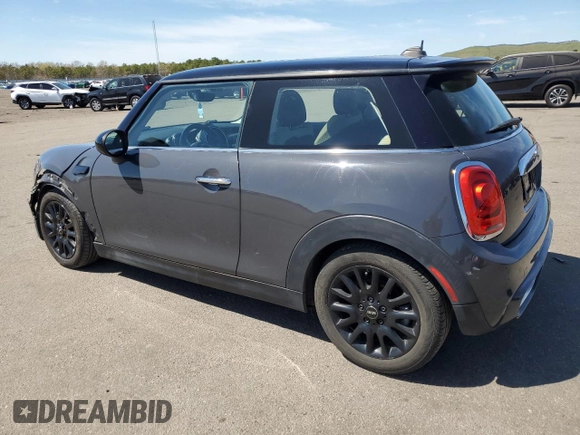 2014 MINI Hardtop S with VIN WMWXM7C54ET985344, listed as a Copart auction lot 55242945 with 87,017 mi miles and Salvage Title. Bid and sale history available at DreamBid. Image 2.