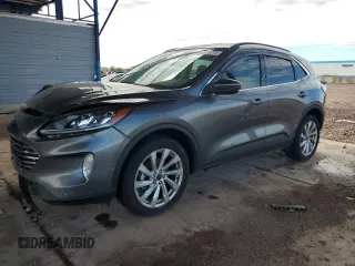 2021 Ford Escape Titanium with VIN 1FMCU9J92MUA08792, listed as a Copart auction lot 59270215 with 29,194 mi miles and Salvage title. Bid and sale history available at DreamBid. Image 1.