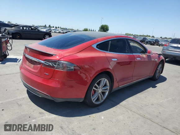 2014 Tesla Model S 60 with VIN 5YJSA1H1XEFP31861, listed as a Copart auction lot 65275815 with Not provided miles and Clean title. Bid and sale history available at DreamBid. Image 3.