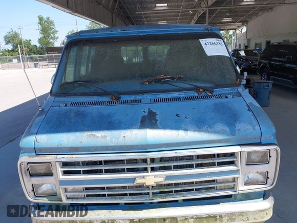 1989 Chevrolet Chevy Van z VIN 1GCEG25K3K7104404, wystawiony jako IAAI lot #42266335 z przebiegiem 96 272 mil mil oraz . Historia ofert i sprzedaży dostępna na DreamBid. Obrazek 6.