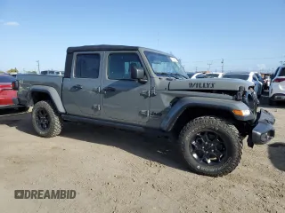 2023 Jeep Gladiator Willys z VIN 1C6HJTAG0PL561098, wystawiony jako Copart lot #51646485 z przebiegiem 20 554 mil mil oraz Szkoda całkowita • Salvage title. Historia ofert i sprzedaży dostępna na DreamBid. Obrazek 4.