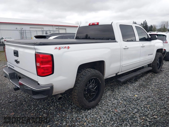 2017 Chevrolet Silverado 1500 LT with VIN 1GCUKREC1HF135337, listed as a IAAI auction lot 41267713 with 114,417 mi miles and . Bid and sale history available at DreamBid. Image 4.