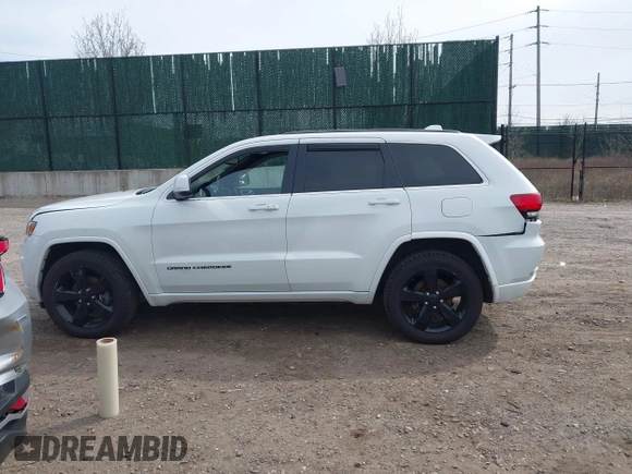 2015 Jeep Grand Cherokee Laredo with VIN 1C4RJFAG4FC905092, listed as a IAAI auction lot 41945933 with 97,854 mi miles. Bid and sale history available at carsss.com. Image 14.