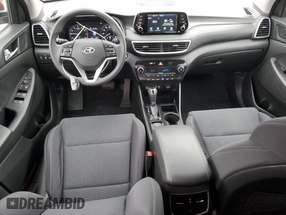 2019 Hyundai Tucson Sport with VIN KM8J33AL0KU875219, listed as a Copart auction lot 86816254 with 82,829 mi miles and Salvage Title. Bid and sale history available at carsss.com. Image 8.