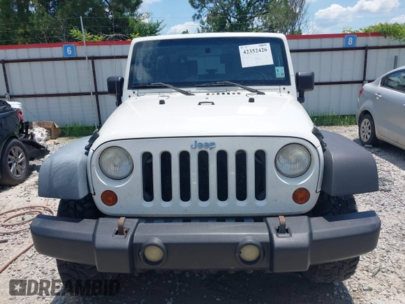 2009 Jeep Wrangler X with VIN 1J4FA24149L781794, listed as a IAAI auction lot 42352426 with 99,128 mi miles and . Bid and sale history available at DreamBid. Image 12.
